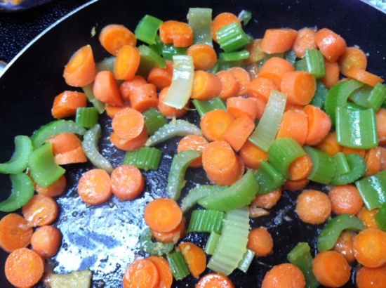 Carrots and celery cooked in fresh ginger and garlic. Add a bit of broth for flavor, they will absorb the fluid and then brown a little bit.